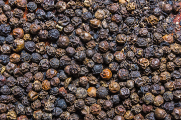 background of black peppercorns