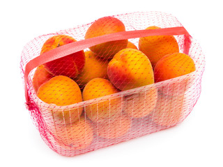 Apricots in Plastic Container Isolated on White