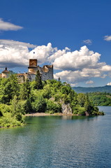 Castle on a hill besides a lake (Nedec, Poland)