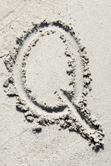 Sand beach alphabet: letter Q