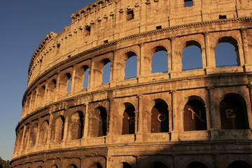 Fototapeta premium Colosseum of Rome with blue sky, Italy