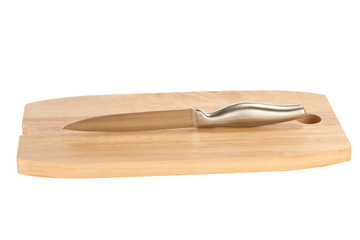 table knife and wooden cutting board
