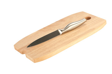 table knife and wooden cutting board
