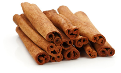Cinnamon sticks spice isolated over white background.