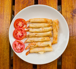 Fried shrimp dumplings on a plate.