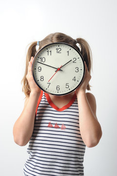 Kind und Uhr