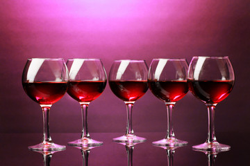 Wineglasses on purple background