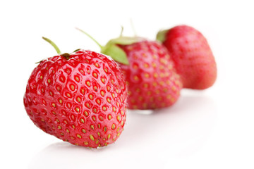 Sweet ripe strawberries isolated on white