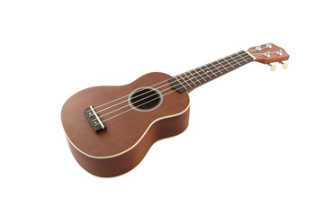 Obraz na płótnie Canvas Mała gitara (ukulele) od ciała na białym tle.