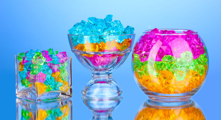 A glasses with colorful decorative stones