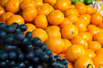 Fresh fruits orange white grape in market