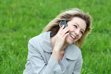 portrait of young woman talking on mobile phone