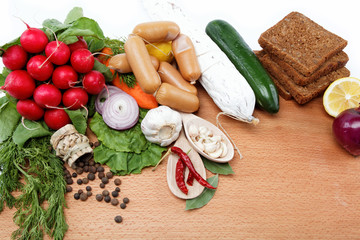 Healthy food. Fresh vegetables and fruits on a wooden board.