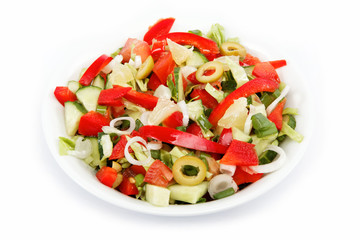 Healthy food. Fresh vegetable salad on a white background.
