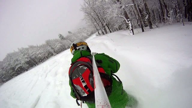 Ski sport man downhill at winter with slow motion