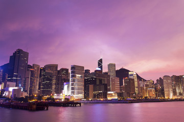 Sunset in Hong Kong with office buildings background