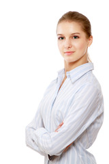 Portrait of a  young business woman standing with folded hand