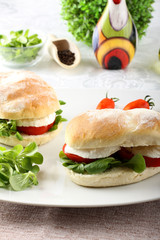 Sandwiches with mozzarella, tomato and lettuce