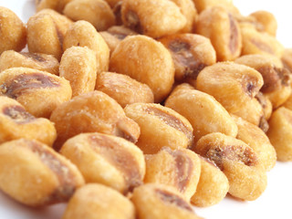 Close up of fried, salted corn seeds.