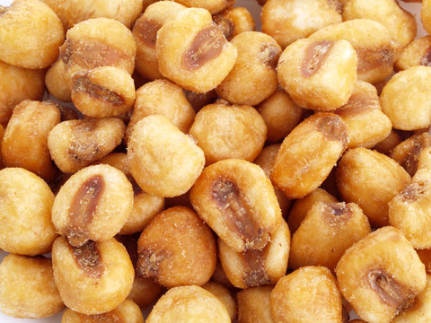Close up of fried, salted corn seeds.