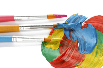 Abstract gouache paint and brushes, isolated on white
