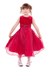 Little beautiful girl in the fashion dress