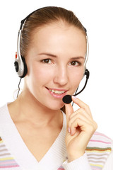 Young beautiful woman with headset isolated on white background