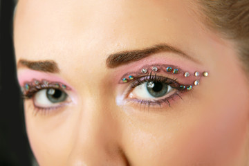 Woman eye with exotic style makeu