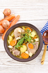 Vegetable stew with meat and herbs