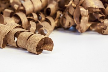 wooden shaving on pine wood background