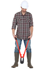 A handyman with his pliers.