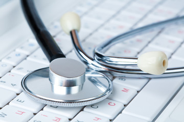 Stethoscope on a modern keyboard