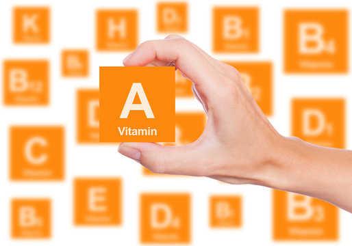 Hand Holds A Box Of Vitamin A