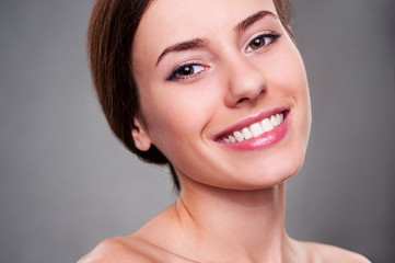 alluring young woman smiling