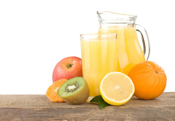 fresh fruits and juice in glass isolated on white
