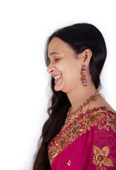 Beautiful Indian happy woman in pink sari