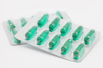 green color of soft capsules in the strips