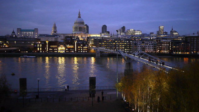 The Millenium Bridge at the Tate Modern at dusk.