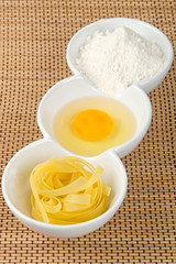 Pasta, egg yolk and flour