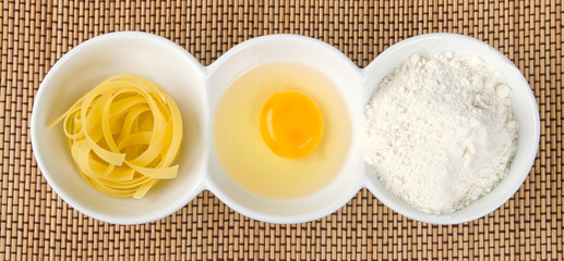 Pasta, egg yolk and flour