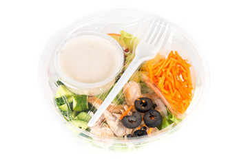 Salad in plastic container