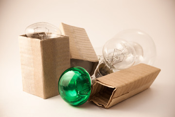 Old incandescent light bulbs in cartons