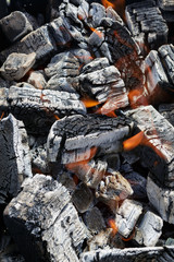 Flaming wood charcoal