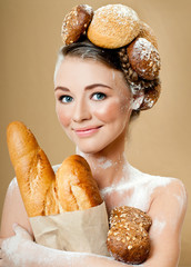 cheerful girl with a tasty bread