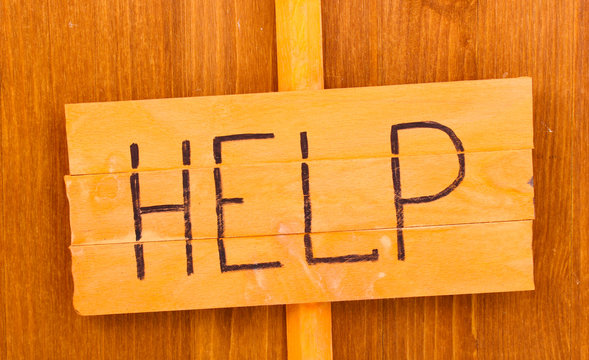 Fototapeta Help wooden board on wooden background