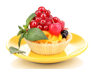 Dulcet cake with fruit and berries isolated on white