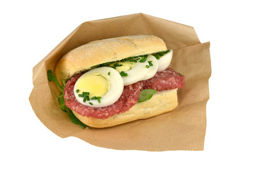 Roll sausage with oxen sausage and egg on a white background.