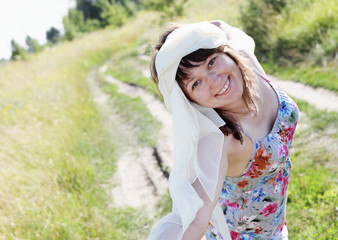 Happy Woman Walking the Meadow
