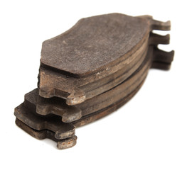 brake pads on a car on a white background