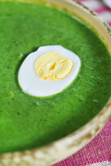 Spinach cream soup with egg
